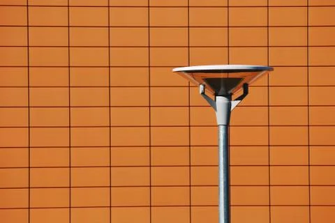 Lantern in from of a red wall Stock Photos