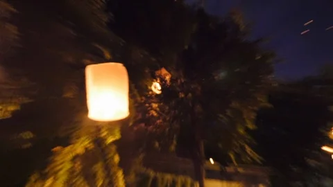 A lantern stuck in trees in chiang mai thailand Stock Footage 100361600