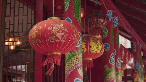 A lantern sways in the wind at a Chinese temple. Video stock 246477317