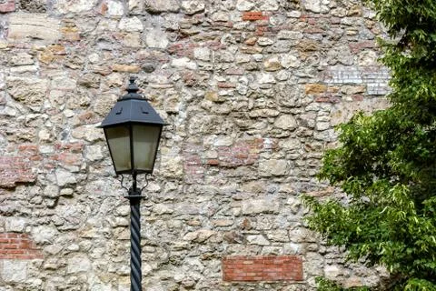 Lantern on the wall background. Stock Photos