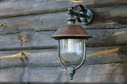 Lantern on the wall. Stock Photos
