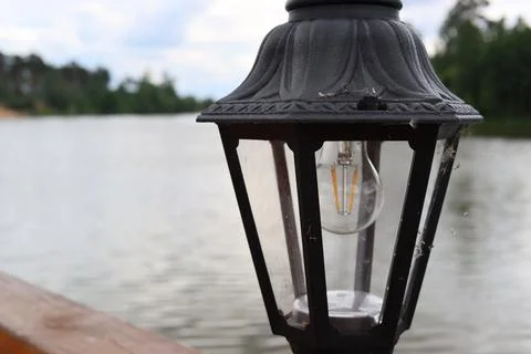 Lantern in the web Stock Photos