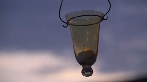 Lantern in the wind at sunset Video stock 11675062