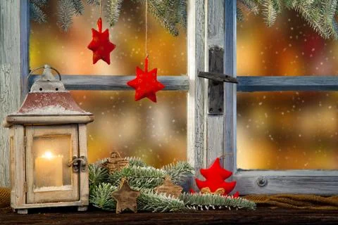 Lantern on window sill in winter Fotos Stock