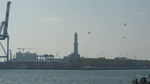 Lanterna lighthouse in Genoa port and boats ships passing. Marine sea Video stock 150410838