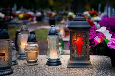 Lanterns and candles on the grave devoted to All Souls Day Fotos Stock
