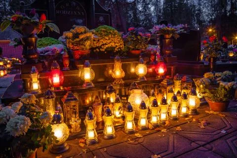 Lanterns and candles on the grave devoted to All Souls Day Foto stock