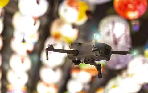 Lanterns and drones Stock Photos