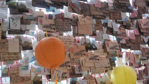 Lanterns and Messages on the Wall 4K Cultural and Scenic Video Stock Footage 295720853