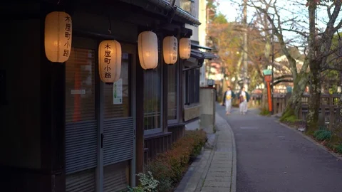 Lanterns are being decorated outside of traditional Japanese ryokan Stock Footage 99529592
