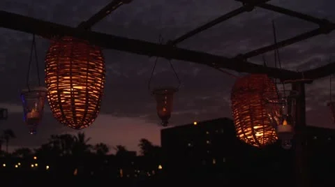 Lanterns blowing in the wind at sunset Video stock 11676152