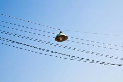 Lanterns on  cables. Stock Photos