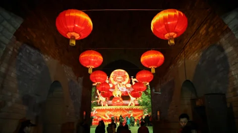 Lanterns decorations and people roaming during chinese spring festival Stock Footage 34260886