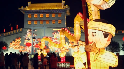 Lanterns decorations and people roaming during chinese spring festival Stock Footage 34261181