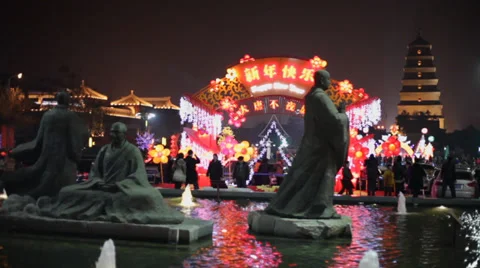 Lanterns decorations and people roaming during chinese spring festival Stock Footage 34299254