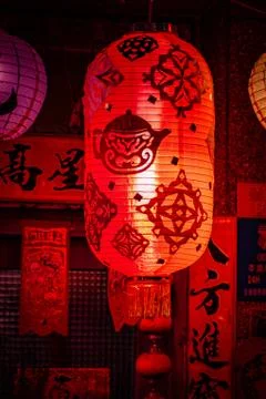 Lanterns hung up in front of a house. Stock Photos