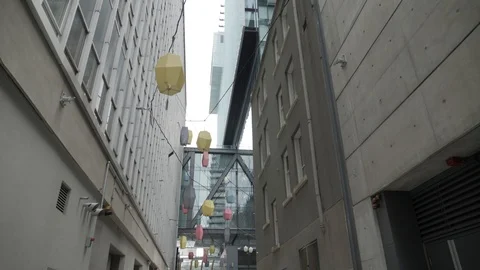 Lanterns in urban city alley Stock Footage