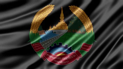 Laos emblem waving gracefully on a soft black fabric surface Stock Footage 344031093
