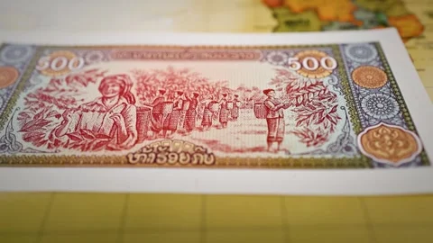 Laos Five Hundred Kip Banknote Showing Agricultural and Irrigation Workers Stock Footage 340483375