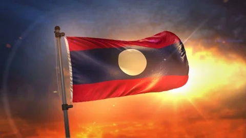Laos Flag Backlit At Beautiful Sunrise Loop Slow Motion 4K Stock Footage 76546252