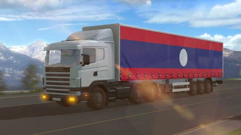 Laos flag shown on the side of a large truck Stock Footage 122102092