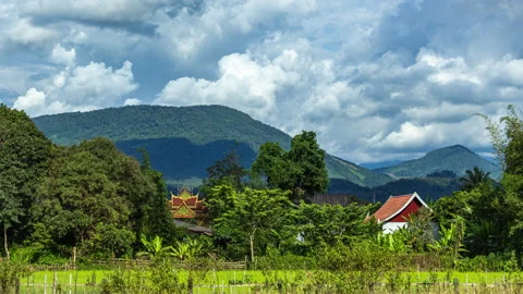 Laos rural landscape panoramic view green mountains dense tropical foliage Stock Footage 317442446