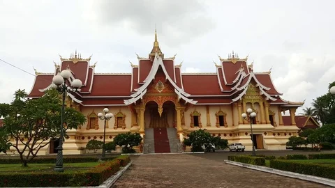 Laotian Buddhist temple from outside, Pha That Luang, Vientiane, Laos Stockbeeldmateriaal 75025342