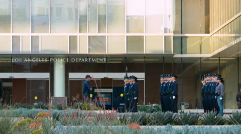 LAPD headquarters with cadets drawing their guns in Downtown LA 4K Stock Footage 62258414