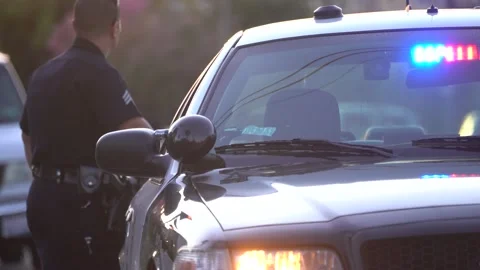 LAPD officers working at scene Stock Footage 142644824