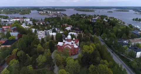 Lappeenranta church, Cinema 4k aerial landing view of villtmandsstrand church Stock Footage