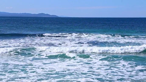 Lapping of the blue waves Stock Footage 128927354