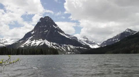 Lapping waves on lake with mountain 스톡 동영상 48339265