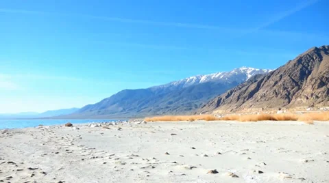 Lapping Waves on a Mountain Lake Beach Video stock 37626348