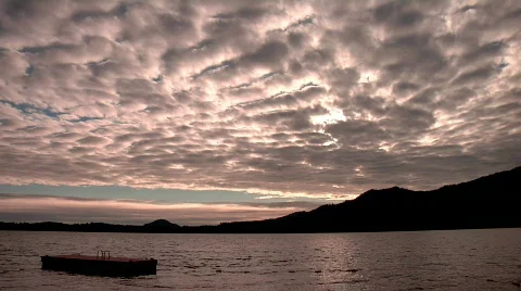 Lapsed Clouds over Lake Sunset BEAUTIFUL Stock Footage 138289