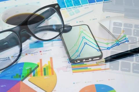 Laptob and graphs Stock Photos