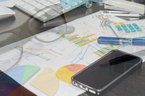 Laptob and graphs Stock Photos