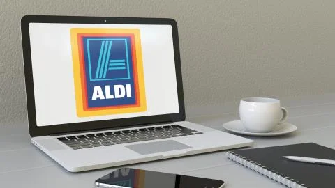 Laptop with Aldi logo on the screen. Modern workplace conceptual editorial 3D Stock-Illustration