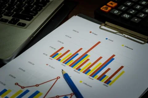Laptop and chart Stock Photos