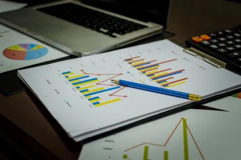 Laptop and chart Stock Photos