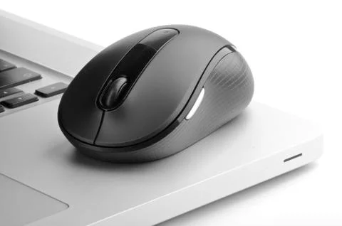 Laptop and computer mouse Stock Photos