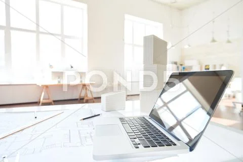 Laptop and engineering objects Stock Photos
