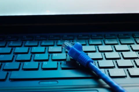 Laptop and Network Cable Stock Photos