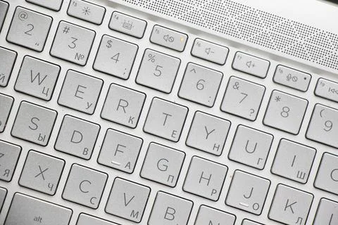 Laptop and notebook computer keyboard close-up, texts, keys Stock Photos