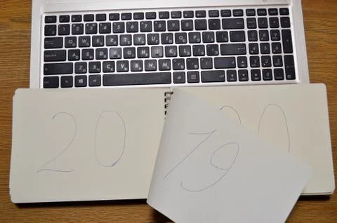 Laptop and notebook in which it is written 2019 2020. Foto stock