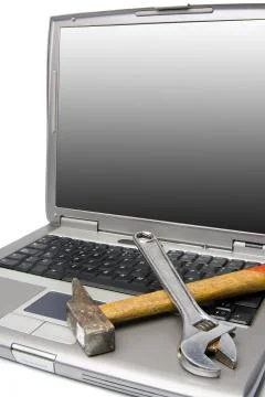Laptop and tools Stock Photos