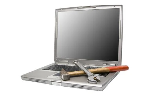 Laptop and tools Stock Photos