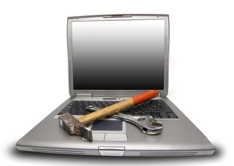 Laptop and tools Stock Photos