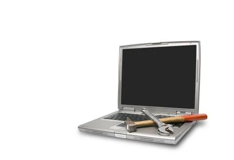 Laptop and tools Stock Photos