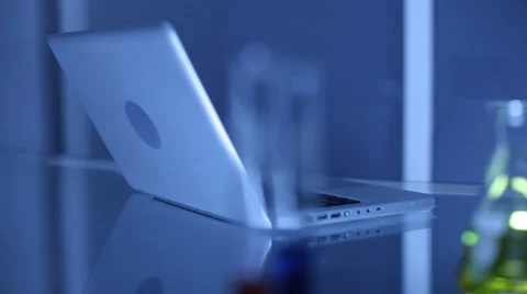Laptop and vial Video stock 61665384