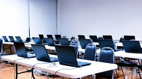 Laptop arranging rows in the training room Stock Photos